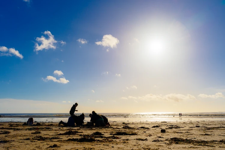 Children on the beach making sandcastles