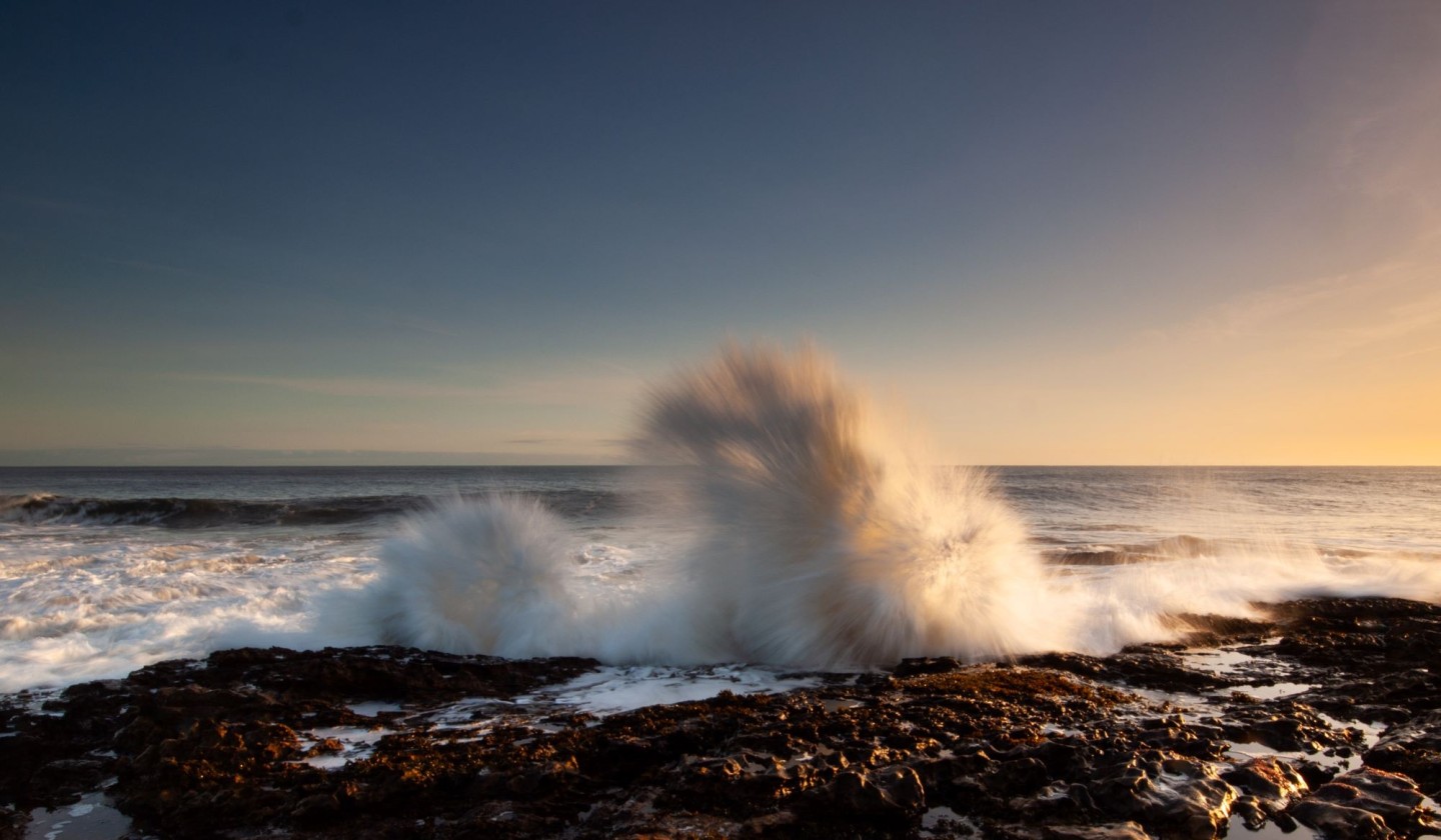 Waves crashing against the rocks at Howick, Northumberland